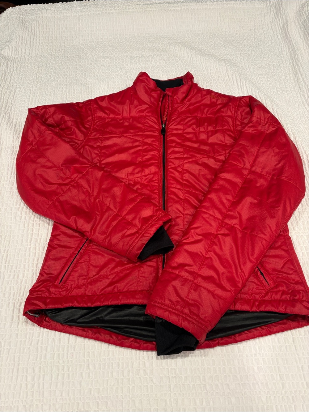 Sugoi Women’s Bright Red Quilted Puffer Jacket
Size M
